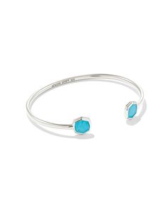 A minimalist pinch cuff bookended with our signature stone-inlaid shape, the Davis Sterling Silver Small Cuff Bracelet in Turquoise is a stacking staple. No matter the size of your wrist, it’s sure to fit you and your one-of-a-kind style. Modern Turquoise Cuff Bangle Bracelet, Modern Turquoise Cuff Bangle, Adjustable Turquoise Cuff Bracelet Modern Style, Adjustable Turquoise Modern Cuff Bracelet, Sold Out Sign, Silver Collection, Demi Fine Jewelry, Genuine Turquoise, Kendra Scott