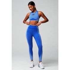 Fabletics Unstoppable 2 Piece Seamless Set, Comes With Seamless Fusion Low Impact Bra And High-Waisted 7/8 Legging, Color Is Luminary Blue With Bali Blue And Quicksand Accents, Racer Back Style With Keyhole Front As Shown, New With Tags Still Attached And Will Come In Packaging As Shown, Seamless Leggings Have No Pockets, High Waist Band, Made Of Polyester, Nylon, And Spandex, Fabletics Logo In Orange Print On Both Pieces, Both Size Medium Womens Snake Print Leggings, Fabletics Leggings, Red Leggings, Orange Print, Green Leggings, High Waisted Flares, Ribbed Leggings, Blue Leggings, Floral Leggings