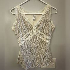 Size Xl Lace Pattern With Tan Underneath For Non See Thru. Can Be Worn With Suit Jacket Or Any Occasion. Brand New, Never Worn But Does Not Have Tags Fitted White Tank Top With Delicate Lace, White Fitted Lace Camisole Top, Lace V-neck Tops With Built-in Bra, Fitted Lace V-neck Top With Built-in Bra, White Delicate Lace Camisole Top, White Lace Tops With Built-in Bra, Lace Tops With Built-in Bra For Loungewear, Fitted V-neck Cream Tank Top, Fitted Cream V-neck Tank Top