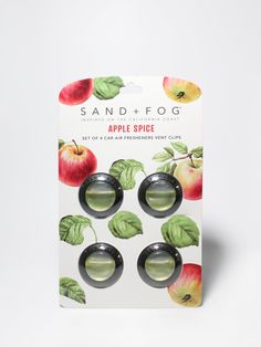 four apple spice plugs with green leaves and red apples