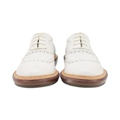 Ferragamo oxford shoes in white leather with brown soles and white laces. Brand = Salvatore Ferragamo Condition = 9/10, like new Size = Men's 8 (Fit like 8.5) Material = Leather SKU = 21749-5 White Plain Toe Lace-up Shoes For Derby, White Lace-up Shoes With Brogue Detailing, White Leather Lace-up Shoes With Textured Sole, Classic White Lace-up Leather Shoes, White Brogue-detailed Oxfords For Semi-formal Occasions, White Oxford Wingtip Dress Shoes, White Brogue Oxfords For Semi-formal Occasions, White Wingtip Oxfords With Brogue Detailing, White Oxfords With Brogue Detailing For Semi-formal Occasions