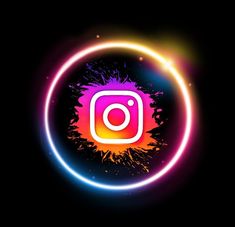 the instagram logo is glowing brightly on a black background with bright circles around it