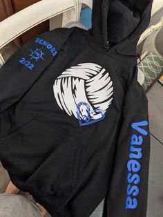 a black hoodie with blue writing on it