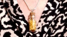 "Known as the \"Success Stone,\" this yellow crystal symbolizes joy, abundance, and clarity. Wear this dainty charm, on an 18\" silver chain, to provide lasting, positive energy to your circle. Charm dimensions are 1\" x .5\"." Bottle Charms, Citrine Crystal, Positive Energy, Crystal Items, Citrine, Silver Chain, Charms, Yellow, Thing 1