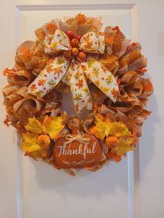 a wreath with the words thank written on it