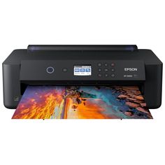 an epson printer is shown with the image on it's screen and its print capabilities