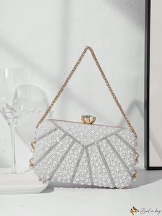 Bird in Bag - Elegant Pearl-Embellished Clutch Bag for Ladies: A Perfect Accessory for Evening Parties, Weddings, Proms, and Formal Events - Complete with Metal Chain Handle for Ease and Style. Complements Party Dresses, Formal Gowns, and Cocktail Attire. Embellished Rectangular Clutch For Banquet, Embellished Rectangular Clutch For Banquets, White Embellished Evening Bag For Party, White Evening Bag With Pearl Embroidery For Party, Elegant Embellished Evening Bag For Prom, Glamorous White Evening Bag For Wedding, Gold Beaded Bridal Accessories For Formal Occasions, Gold Embellished Bridal Accessories For Party, Silver Party Evening Bag With Pearl Embroidery