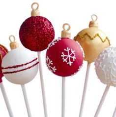 christmas ornament lollipops are on a stick