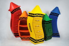 several different colored plastic toys stacked on top of each other