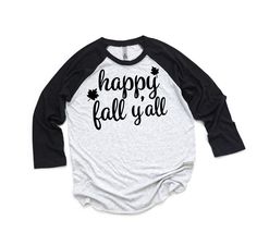 Happy Fall Y'all Three Fourths Raglan Baseball Shirt, Autumn Season Tees, Fall Raglan T-shirt, Pumpkin Patch Tee, Fall Shirts for Women {FABRIC AND SHIRT SIZE INFO} SUPER SOFT!  50% polyester / 25% combed ringspun cotton / 25% rayon jersey  Shirts run true to sizing chart. Shirts available are unisex S, M, L, and XL. Colors may vary from different computer screens, please feel to reach out to me if you would like clarification on any colors!  { WASHING INSTRUCTIONS } Turn shirt inside out and machine wash cold with like colors. To keep your shirt in the best possible condition, tumble dry low or (in my opinion) the best is to let it hang dry. Do not iron over vinyl and do not bleach. Please Note:  *These shirts run on the larger side. Order your normal size for a looser, comfier fit. Size Casual Fall Tops With Funny Text, Casual Fall Tops With Lettering, White Shirt With Text Print For Fall, Relaxed Fit Tops With Lettering For Fall, Fall Cotton Tops With Lettering, Fall Crew Neck Top With Lettering, White Tops With Funny Text For Fall, Tri-blend Crew Neck Top For Fall, Pre-shrunk Black Shirt For Fall