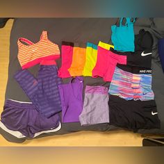 Lightly Worn, Great Quality Workout Clothing. Mostly Nike. 6 Pairs Of Nike Pro Shorts And A Pair Of Nike Pro Leggings. A Sports Bra. 3 Tanks. 3 Other Pairs Of Shorts. Most Are Size M. A Few Smalls And Larges. An Awesome Bundle, Some Pieces Have Never Been Worn Nike Fitted Sports Sets, Nike Fitted Sportswear Sets, Fitted Nike Sports Sets, Nike Pro Leggings, Nike Pro Shorts, Workout Clothing, Nike Workout, Shorts Nike, Shorts Athletic