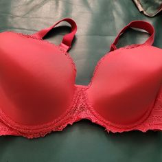 Calvin Klein Padded Bra With Lace Trim, 36d. Pretty Deep Coral Bra With Lace Trim, Adjustable Back And Stretch Straps. Lace Trim Along Edges, Sides And Between Cups. Never Worn. Stretch Pink Padded Bra, Elegant Pink Stretch Bra, Elegant Padded Pink Bra, Elegant Pink Padded Bra, Pink Fitted Full Coverage Bra, Pink Full Cup Padded Bra, Pink Full Coverage Bra, Pink Full Cup Bra With Padded Cups, Feminine Pink Partially Lined Bra