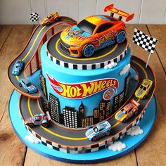 a birthday cake with cars on it