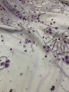 We offer a variety of fashion handmade fabric，those are widely use for wedding dress，garment and fashion cloth. we sell it by yard，our minimum order is 1 yards，and we always package it 15 yards for one roll，the width is about 130cm/50 inch Material ： tulle ,pearls, beads ,Rayon,polyester. Symmetrical embroidery floral pattern, with lovely flowers in the middle, scalloped border. You can also cut and use separately. Perfect for dress, tops, wedding veil. You can split the piece up and have one sc Scalloped Border, Beaded Lace Fabric, Dress Tops, For Wedding Dress, Embroidery Floral, Handmade Fabric, Wedding Veil, Beaded Lace, Lace Fabric