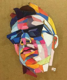 a painting of a man's face made out of different colored pieces of paper