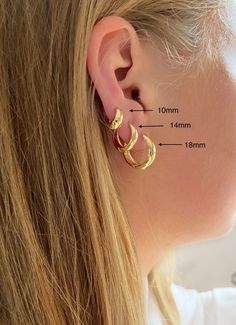 These 14k gold filled hoop earrings are great for everyday wear. They look perfect on their own or stacked with other earrings DETAILS - 14k gold filled hoop earrings come in three sizes:     -18mm (outer diameter)x 4mm thickness     -14mm (outer diameter) x4mm     -10mm (outer diameter)x 3mm - sold as pair - Hypoallergenic, lead free, nickle free - Comes beautifully packaged ready for gift giving PRODUCTION AND SHIPPING - We offer FREE WORLD WIDE shipping  - Every piece is handmade to order in our little studio in Melbourne, Australia - We aim to ship your order in 1-2 business days - Estimated domestic (Australia) shipping times: 10-15 business days - Estimated international shipping times: 15-25 business days WHAT IS GOLD FILLED Gold filled is the closest alternative to solid gold. It i Gold Stackable Earrings For Gift, Gold Stackable Hoop Earrings As Gift, Gold Stackable Huggie Earrings For Everyday, Everyday Gold Stackable Huggie Earrings, Dainty Yellow Gold Stackable Hoop Earrings, Gold Small Hoop Stackable Earrings, Gold Stackable Hoop Earrings For Everyday, Gold Stackable Earrings 14k Gold Filled, Gold Stackable 14k Gold Filled Earrings