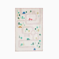 a child's play mat with cars and trees on the road in pastel colors