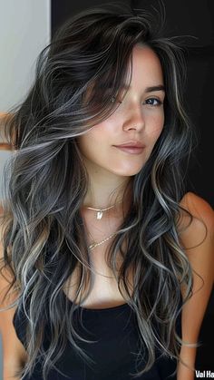 Silver Symphony: 25 Trendy Silver Hair Color Ideas for Your Stunning Look Black And Grey Balayage Hair, Subtle Gray Highlights On Dark Hair, Silver Hair Brunette, Dark Hair Grey Streak, Grey Balayage Black Hair, Long Dark Hair With Gray Highlights, Reverse Balayage Cool Tone, Silver Dark Hair, Dark Hair With Silver Underneath