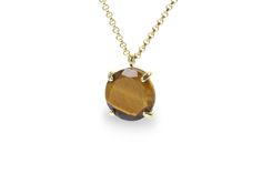 "Starring a lovely Tiger Eye stone, this simple necklace gives a vibrant and unique touch to your style. This gem pendant necklace has a 14k gold-filled finish. This stunning piece of necklace for women will be a beautiful statement and will be perfect to wear with a matching Tiger Eye gold ring. ♥ Gemstone Type - Tiger Eye ♥ Gemstone Size - 16mm ♥ Gemstone Cut - Round - More options available in the drop down menu ♥ Metal Type (Main Photo) - 14k Gold Filled - More options available in the drop Brown Faceted Jewelry Gift, Tiger Eye Necklace, Gem Pendant, Large Pendant Necklace, Tigers Eye Necklace, Citrine Necklace, Fancy Gifts, Tigers Eye Gemstone, Square Rings