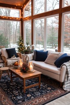 a living room filled with furniture and a christmas tree