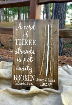 a wooden sign that says, a good three stands is not easily broken and two strings are