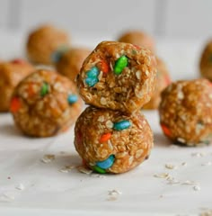 no bake peanut butter balls stacked on top of each other with sprinkles