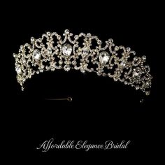 a tiara with crystal stones and pearls on the headpiece is shown against a black background