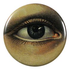 a button with an eye drawn on it