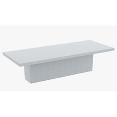 a white table sitting on top of a white floor