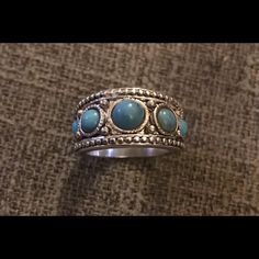 Turquoise Tribal Ethnic Ornate Embellished Circle Stone Eternity Silver Ring Size 7. Five Turquoise Stones In Descending Size With The Central As The Largest. Lots Of Carved Silver Dots Created A Cool Tribal/Ethnic/Southwestern/Unique Look! Thick Sturdy Band. New. If You Want It, Don’t Let It Get Away Send Me An Offer! I Love To Do Bundle Order Discounts! Adjustable Bohemian Turquoise Ring With Stone Setting, Blue Bohemian Jewelry With Stone Setting, Bohemian Turquoise Ring With Stone Setting, Bohemian Silver Turquoise Ring With Stone Setting, Silver Bohemian Turquoise Ring With Stone Setting, Gold Wire Ring, Silver Wire Rings, Pewter Ring, Geode Ring