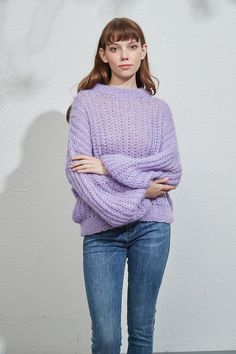 "Beautiful elegant mohair sweater is hand knitted of premium fluffy Angola mohair yarn that is soft, so light and warm. The long mohair sweater is perfect for smart and casual everyday outfit. Wear it with skinny, jeans or skirt. You can wear it on bare skin or above lace top for more polished look.  This sweater features: * oversized looking * Puffy sleeves * 60% angola kid Mohair/ 20% wool/ 20% viscose. * Crew-neck Color: Lilac  Pls. see color options for other colors and leave the notes. SIZE Trendy Mohair Sweater, Purple Mohair Sweater For Fall, Pull Mohair, Woman Sweater, Mohair Yarn, Hand Knit Hat, Sweater Oversized, Sweater Oversize, Bare Skin