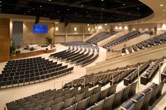 an empty auditorium filled with lots of seats