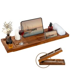 a wooden tray with two pictures and some candles