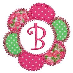 a pink and green flower wreath with the letter b in it's center surrounded by polka dots