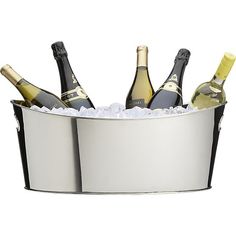 several bottles of champagne in an ice bucket