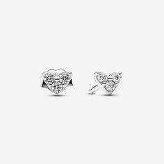 Big style comes in small packages with the Triple Stone Heart Stud Earrings. Three round stones are set in the shape of a heart in these sterling silver earrings. A heart-shaped butterfly back is a sweet finishing touch. Delicate and refined, these tiny heart stud earrings are a dainty addition to any look. They're also a perfect, versatile gift for a loved one, imbued with subtle meaning and elegant style. - Pandora Triple Stone Heart Stud Earrings - Sterling silver / Cubic Zirconia / Clear Heart Stud Earrings, Tiny Heart, Heart Studs, Stone Heart, Heart Earrings Studs, Pandora Jewelry, Sterling Silver Earrings Studs, Lab Created Diamonds, Elegant Style