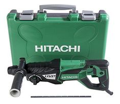 the hitachi electric drill is in its case and ready to be used as a tool