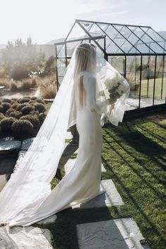 This exquisite minimal bridal veil is an all-in-one double layered piece that gives you the option to wear the blusher over your face or have both lengths of fabric cascading down your back for a tiered veil look.Crafted from the softest Italian tulle, this cathedral length veil is both delicate and lightweight. Tap image to see more of this veil and more! On Etsy Double Veil, Veil Over Face, Mantilla Veil, Cathedral Length Veil, Pearl Veil, Tulle Veil, Blusher Veil, Wedding Veil Accessories, Wedding Veils Lace