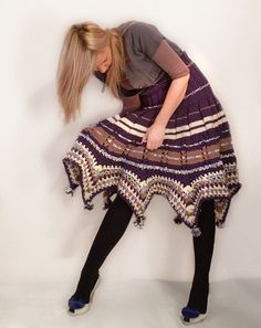 Keep yourself warm and stylish with this purple poncho/skirt. Colors: Royal purple, white, tan and some bluish details Length: 24.8 inches (63 cm) without polo neck Fits all sizes:S - XXXL Want something tweaked on this poncho, or would you like it in a different size? I love custom orders, so just send me a convo and we can arrange this to be made just for you! Crocheted Dresses, Crochet Skirt Pattern, Turtleneck Poncho, Purple Crochet, Creative Knitting, Loom Knitting Patterns, Crochet Skirts, Crochet Dresses, Crochet Stitches For Beginners