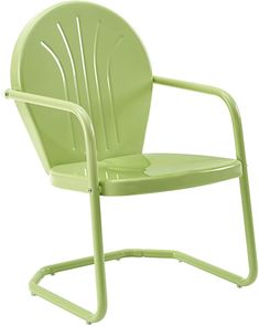 a lime green plastic chair with arms and back rests on a white surface, while the rest of the chair is off to the side