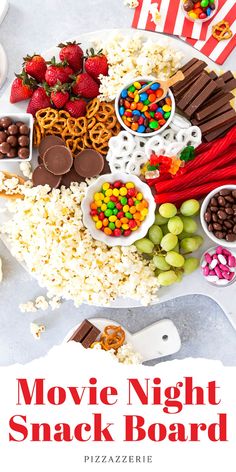 the movie night snack board is full of snacks and candy