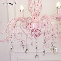 a pink chandelier hanging from the ceiling