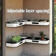 there are three shelves with plants in them on the side of a building that says, adjustable layer spacing