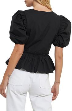 Ruffles on the shoulders enhance the puff sleeves of a charming cotton top made with more frill topping the gathered peplum. V-neck Short sleeves 100% cotton Hand wash, dry flat Imported Ruched Cotton Puff Sleeve Top, Fall Puff Sleeve Peplum Top With Ruffles, Fall Peplum Top With Puff Sleeves And Ruffles, Fall Peplum Top With Ruffles And Puff Sleeves, Fitted Cotton Puff Sleeve Top With Ruffles, Spring Black Puff Sleeve Top With Ruffles, Black Ruffled Puff Sleeve Top For Spring, Black Puff Sleeve Top With Ruffles For Spring, Cotton Ruffled Short Sleeve Peplum Top