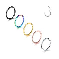 three different colors of rings on a white background