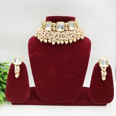 You will absolutely fall in love with these necklace sets. They are minimalistic and can be styled with Indian/Indo-western or Western wear. They are true replicas of the original polki necklaces. Premium Quality Kundan Choker Set with Earrings.  You will absolutely adorn this beautiful classic Premium Quality Kundan Choker set with earrings. Premium Quality and High craftsmanship 100% Satisfaction Guarantee: Long Lasting Plating, High-Quality Stones. Also, It looks great with modern and traditional silhouettes. Weight: 110 grams Adjustable: Yes with a ball and joint Earrings weight: 12 grams each Earrings length: 2 inches Earrings Closure: Screw back Material: Brass *Handmade in India Kundan Choker Set, Kundan Choker, Polki Necklace, Necklace Sets, Choker Set, Indian Wedding Jewelry, Indo Western, Kundan Jewellery, Wedding Jewelry Sets