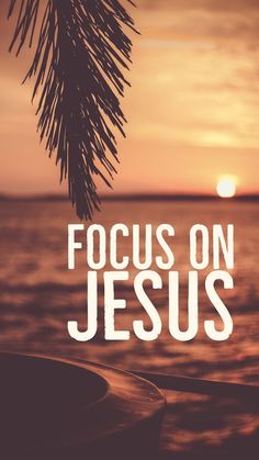 the words focus on jesus written in white over an image of water and palm leaves