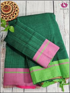 Patteda Anchu sarees are handwoven Handloom sarees from in and around the Villages of Gajendragarh,Karnataka. The saree is name after it’s border and checks pattern is also know as Dundina seraa, devaru seraa,laxmi seraa or pooja seraa. This Patteda Anchu saree is certified with a Handloom Mark and is perfect for the summer weather. It is lightweight for comfort and features a Green body with a Ganga Jamuna border in pink and Green . The modern yet elegant design makes any outing special and inc Patteda Anchu Saree, Green Handloom Cotton Silk Saree, Green Cotton Silk Handloom Saree, Traditional Green Slub Silk Saree, Green Slub Silk Traditional Wear For Puja, Traditional Green Cotton Silk Saree, Green Handloom Slub Silk Dupatta, Green Handloom Tussar Silk Traditional Wear, Green Handloom Raw Silk Traditional Wear