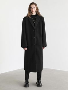 This is timeless and warm single-breasted coat designed for trendy and stylish oversized fit. It has voluminous silhouette and minimized lustrous surface for a more elevated look.- Notch lapels- Button fastenings- Two front welt pockets- Single vent- Internal pocket- Oversized fit - Unisex wear Oversized Solid Wool Coat For Business, Oversized Solid Single Breasted Wool Coat, Oversized Solid Single-breasted Wool Coat, Classic Oversized Solid Pea Coat, Oversized Classic Long Coat, Classic Oversized Long Coat, Oversized Solid Wool Coat For Work, Classic Oversized Outerwear For Business, Oversized Single-breasted Pea Coat For Business