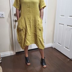 Oversized Short Sleeve Dress In Chartreuse. Deep Front Pockets With Front Drape - That Can Be Undone As There Are Ties Underneath The Dress (Pic 5). Balloon Lantern Hemline Similar To Eileen Fisher. Looks Sooooo Much Better In Person Than These Photos. 100 % Linen Made In Italy Nwt And Never Worn.. Comes From Smoke Free Home Bust Is 22" Hips Are 30" Length From Neck Down 38" Yellow Relaxed Fit Dress For Summer, Yellow Relaxed Fit Midi Dress For Spring, Yellow V-neck Relaxed Fit Dress, Casual Yellow Linen Beach Dress, Yellow Casual Linen Dress For Spring, Yellow Relaxed Fit V-neck Dress, Oversized Casual Midi Dress With Pockets, Yellow Shift Casual Dress, Yellow Shift Dress Casual